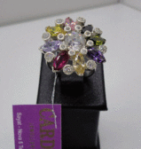 Серебряное кольцо с разноцветными топазами и цирконом