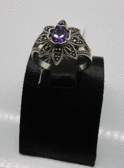Серебряное кольцо с фиолетовым топазом и марказитами