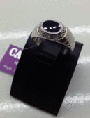 Серебряное кольцо с черным ониксом и цирконом