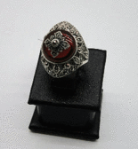 Серебряное кольцо с гранатом и марказитами