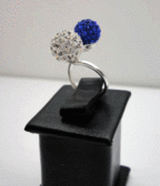 Серебряное кольцо с синим и белым цирконом